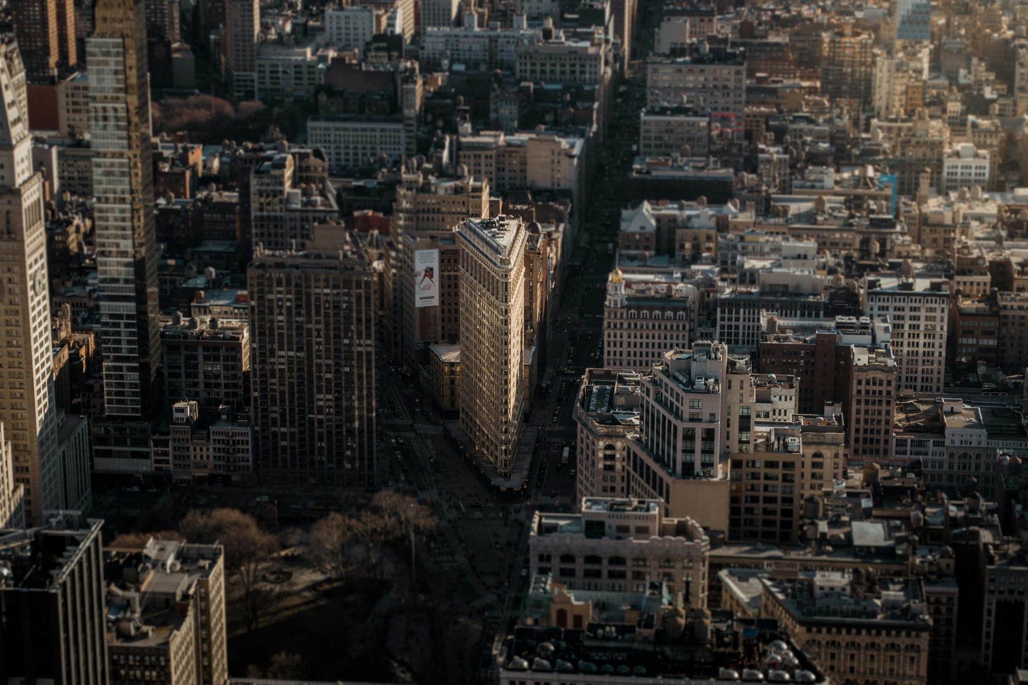 New York City shot from above, with the Flatiron Building prominently in the centre of the image.